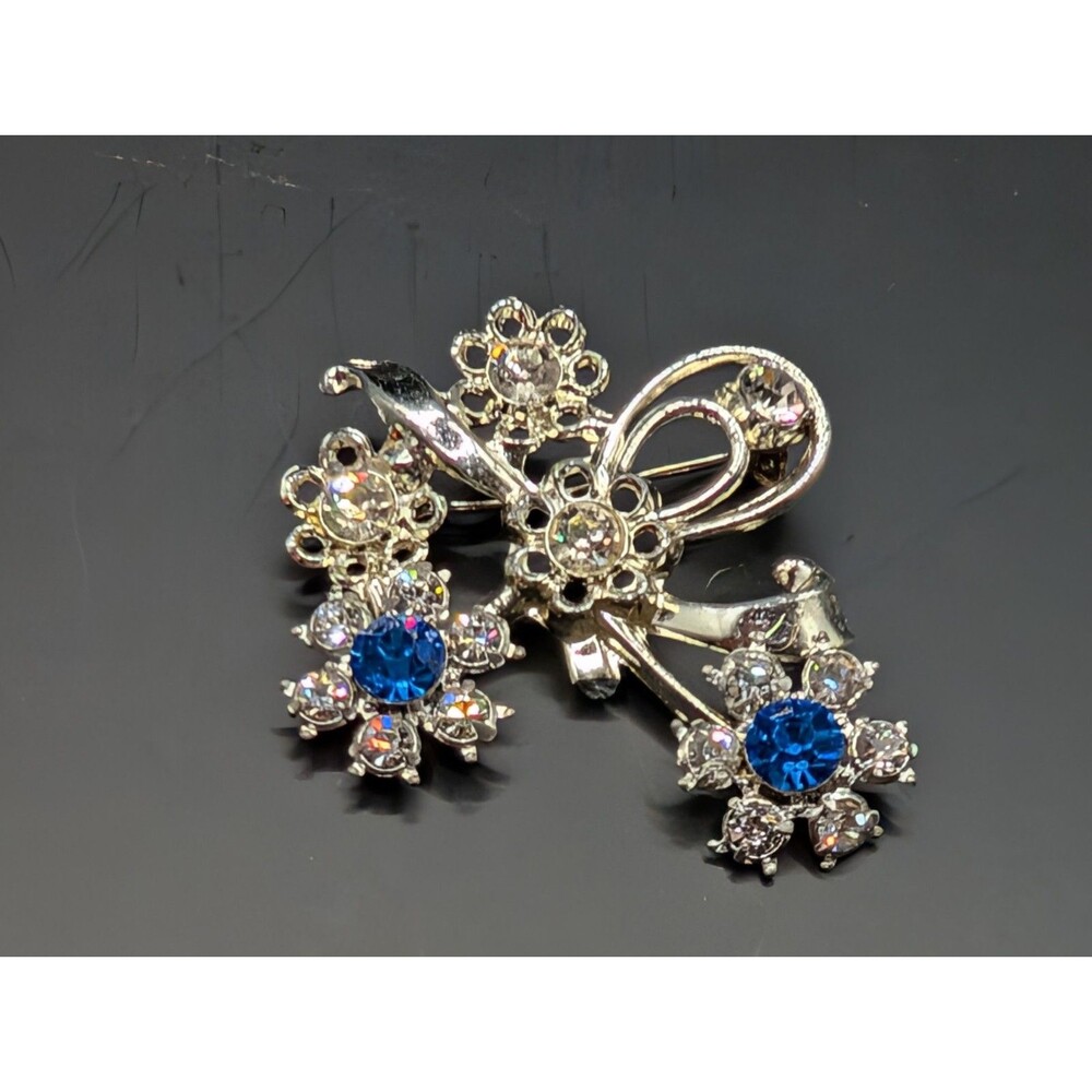 Vintage Ice Blue And Clear Rhinestone Brooch With Flowers